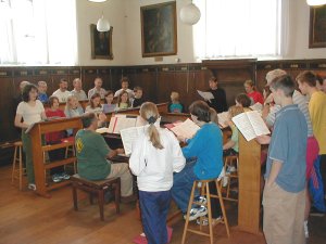 The choir rehearse in the song school at Chichester Cathedral